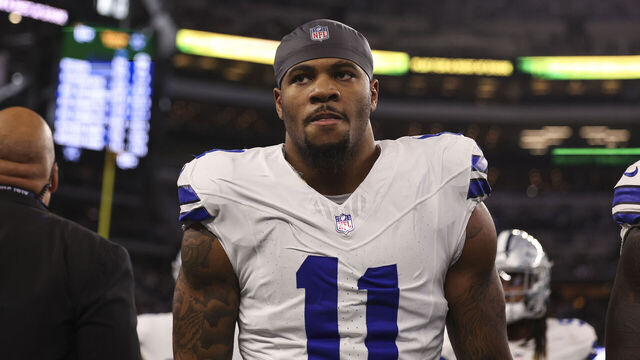 ARLINGTON, TX - JANUARY 14: Micah Parsons #11 of the Dallas Cowboys warms up prior to an NFL wild-card playoff football game against the Green Bay Packers at AT&T Stadium on January 14, 2024 in Arlington, Texas.