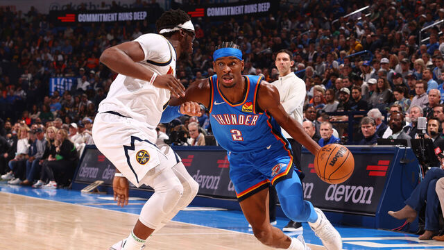 OKLAHOMA CITY, OK - JANUARY 31: Shai Gilgeous-Alexander #2 of the Oklahoma City Thunder dribbles the ball during the game against the Denver Nuggets on January 31, 2024 at Paycom Arena in Oklahoma City, Oklahoma. Mandatory Copyright Notice: Copyright 2024 NBAE