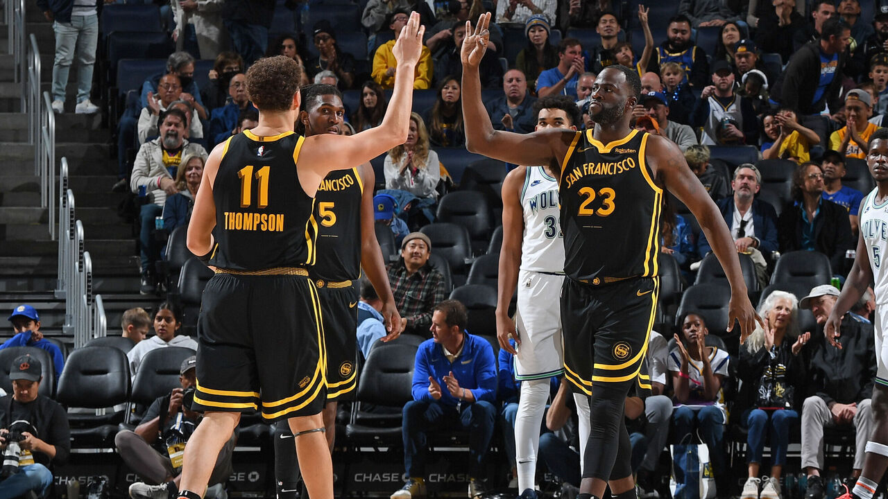 SAN FRANCISCO, CA - NOVEMBER 12: Klay Thompson #11 and Draymond Green #23 of the Golden State Warriors high five during the game against the Minnesota Timberwolves on November 12, 2023 at Chase Center in San Francisco, California. NOTE TO USER: User expressly acknowledges and agrees that, by downloading and or using this photograph, user is consenting to the terms and conditions of Getty Images License Agreement. Mandatory Copyright Notice: Copyright 2023 NBAE