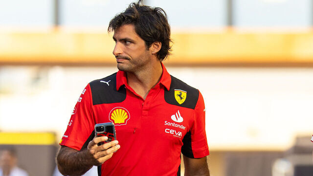ABU DHABI, UNITED ARAB EMIRATES - NOVEMBER 28: Carlos Sainz of Spain and Ferrari F1 team walks in the paddock during Formula 1 testing at Yas Marina Circuit on November 28, 2023 in Abu Dhabi, United Arab Emirates.