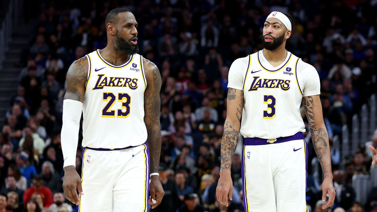 SAN FRANCISCO, CALIFORNIA - JANUARY 27: LeBron James #23 and Anthony Davis #3 of the Los Angeles Lakers stand on the court together during their game against the Golden State Warriors at Chase Center on January 27, 2024 in San Francisco, California.