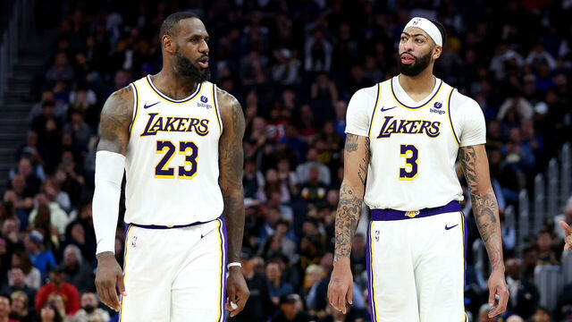 SAN FRANCISCO, CALIFORNIA - JANUARY 27: LeBron James #23 and Anthony Davis #3 of the Los Angeles Lakers stand on the court together during their game against the Golden State Warriors at Chase Center on January 27, 2024 in San Francisco, California.