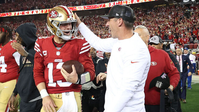 SANTA CLARA, CALIFORNIA - JANUARY 28: Brock Purdy #13 of the San Francisco 49ers celebrates with Head coach Kyle Shanahan after defeating the Detroit Lions 34-31 in the NFC Championship Game at Levi's Stadium on January 28, 2024 in Santa Clara, California.