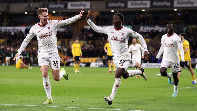 WOLVERHAMPTON, ENGLAND - FEBRUARY 01: Kobbie Mainoo of Manchester United celebrates with Scott McTominay of Manchester United after scoring his team's fourth goal during the Premier League match between Wolverhampton Wanderers and Manchester United at Molineux on February 01, 2024 in Wolverhampton, England.