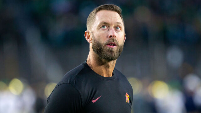 SOUTH BEND, IN - OCTOBER 14: Kliff Kingsbury of USC looks at the Jumbotron during pregame warmups before a game between University of Southern California and University of Notre Dame at Notre Dame Stadium on October 14, 2023 in South Bend, Indiana.