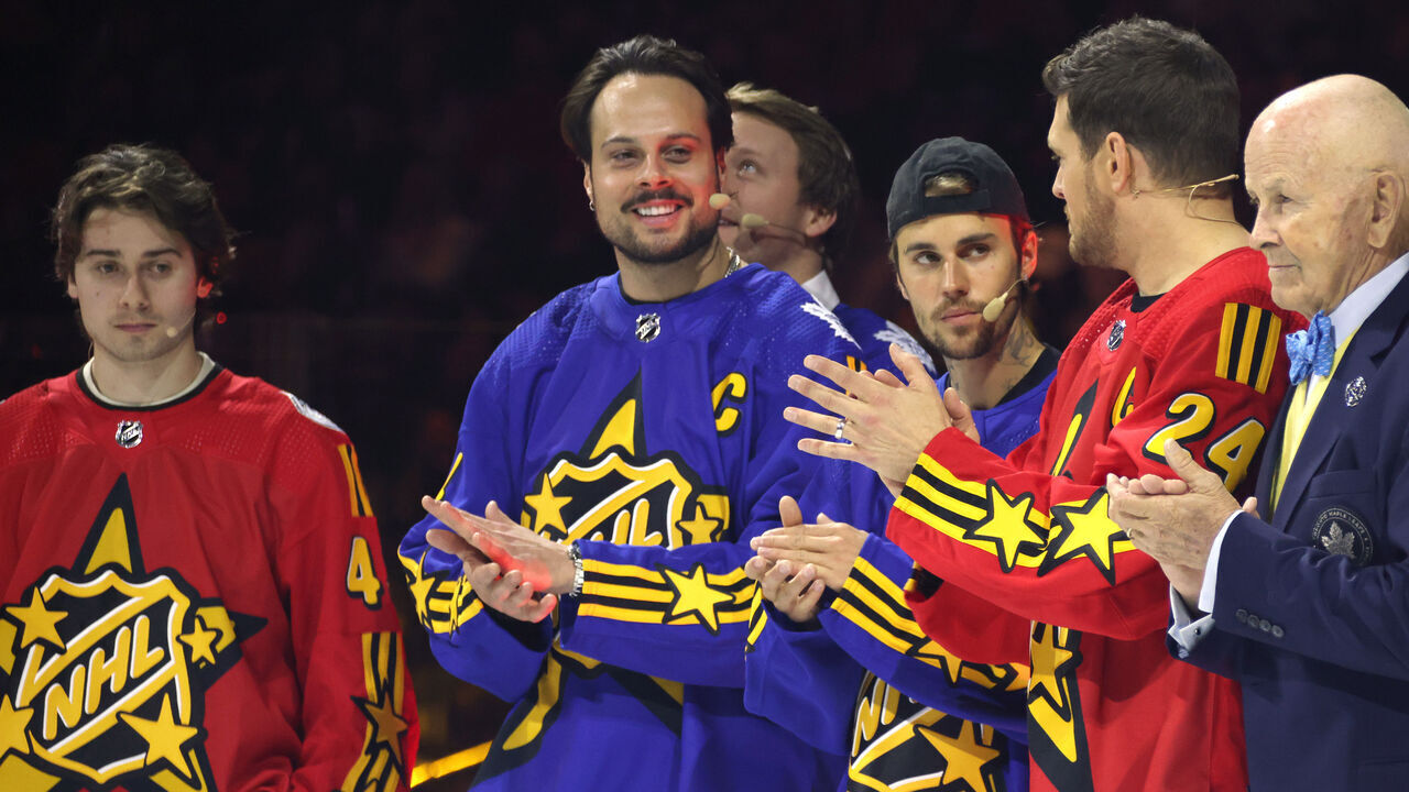 TORONTO, ONTARIO - FEBRUARY 01: (L-R) Quinn Hughes, Auston Matthews, Justin Bieber, Michael Buble and Dave Keon participate in the Tim Horton's NHL All-Star Player Draft at Scotiabank Arena on February 01, 2024 in Toronto, Ontario.