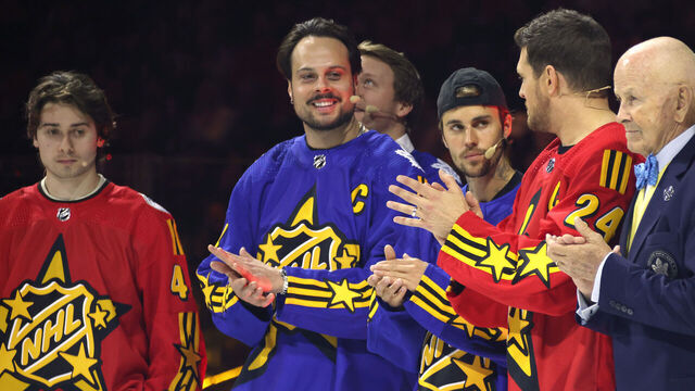 TORONTO, ONTARIO - FEBRUARY 01: (L-R) Quinn Hughes, Auston Matthews, Justin Bieber, Michael Buble and Dave Keon participate in the Tim Horton's NHL All-Star Player Draft at Scotiabank Arena on February 01, 2024 in Toronto, Ontario.