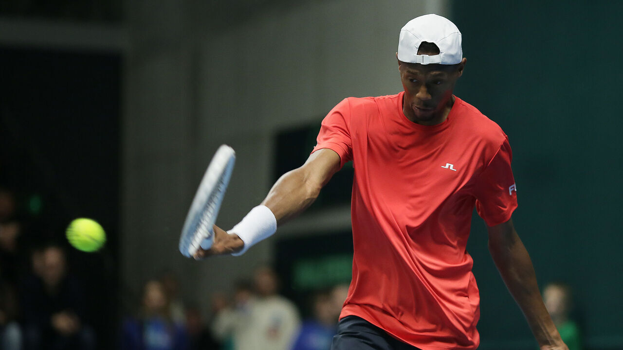 VILNIUS, LITHUANIA - FEBRUARY 1: The USA's Christopher Eubanks plays a return to Ukraine's Viacheslav Bielinskyi during the Davis Cup Qualifier match between Ukraine and USA at SEB Arena on February 1, 2024 in Vilnius, Lithuania.