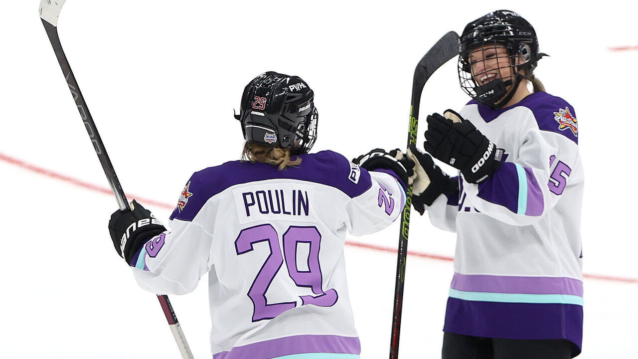 TORONTO, ONTARIO - FEBRUARY 01: Savannah Harmon #15 of PWHL Ottawa and Marie-Philip Poulin #29 of PWHL Montreal celebrate in the 3-on-3 Showcase during 2024 NHL All-Star Thursday at Scotiabank Arena on February 01, 2024 in Toronto, Ontario, Canada.