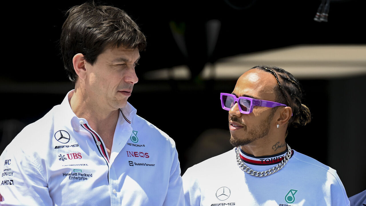 MIAMI GARDENS, FL - MAY 08: Mercedes-AMG Petronas Team Principal & CEO Toto Wolff and Mercedes-AMG Petronas driver Lewis Hamilton (right) talk prior to the start of the Formula 1 CRYPTO.COM Miami Grand Prix on May 8, 2022 at Miami Autodrome in Miami Gardens, FL.
