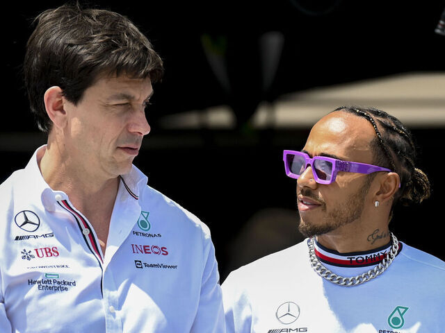 MIAMI GARDENS, FL - MAY 08: Mercedes-AMG Petronas Team Principal & CEO Toto Wolff and Mercedes-AMG Petronas driver Lewis Hamilton (right) talk prior to the start of the Formula 1 CRYPTO.COM Miami Grand Prix on May 8, 2022 at Miami Autodrome in Miami Gardens, FL.