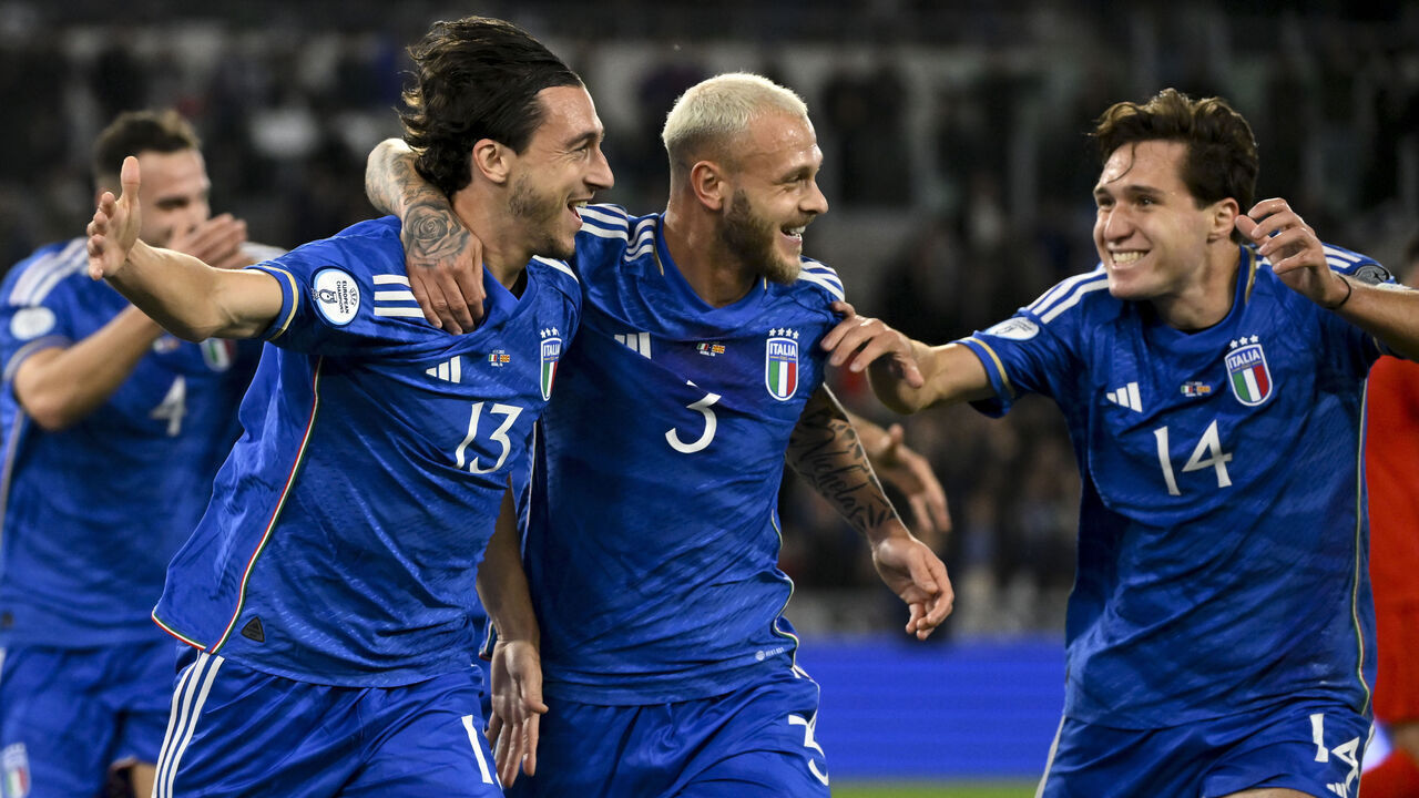 Matteo Darmian of Italy celebrates with Federico Dimarco and Federico Chiesa after scoring the goal of 1-0 during the Euro 2024 Qualifiers 2024 Group C football match between Italy and North Macedonia at Olimpico stadium. Rome (Italy), November 17th, 2023.