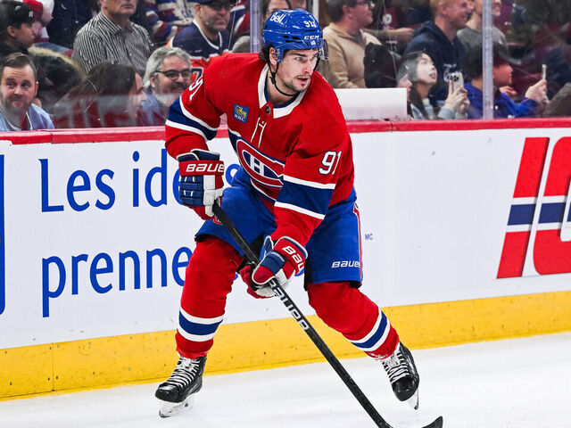 MONTREAL, QC - JANUARY 13: Montreal Canadiens center Sean Monahan (91) plays the puck during the Edmonton oilers versus the Montreal Canadiens game on January 13, 2024, at Bell Centre in Montreal, QC
