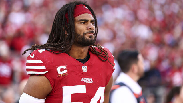 SANTA CLARA, CA - JANUARY 28: Fred Warner #54 of the San Francisco 49ers stands on the sidelines during the national anthem prior to the NFC Championship NFL football game against the Detroit Lions at Levi's Stadium on January 28, 2024 in Santa Clara, California.