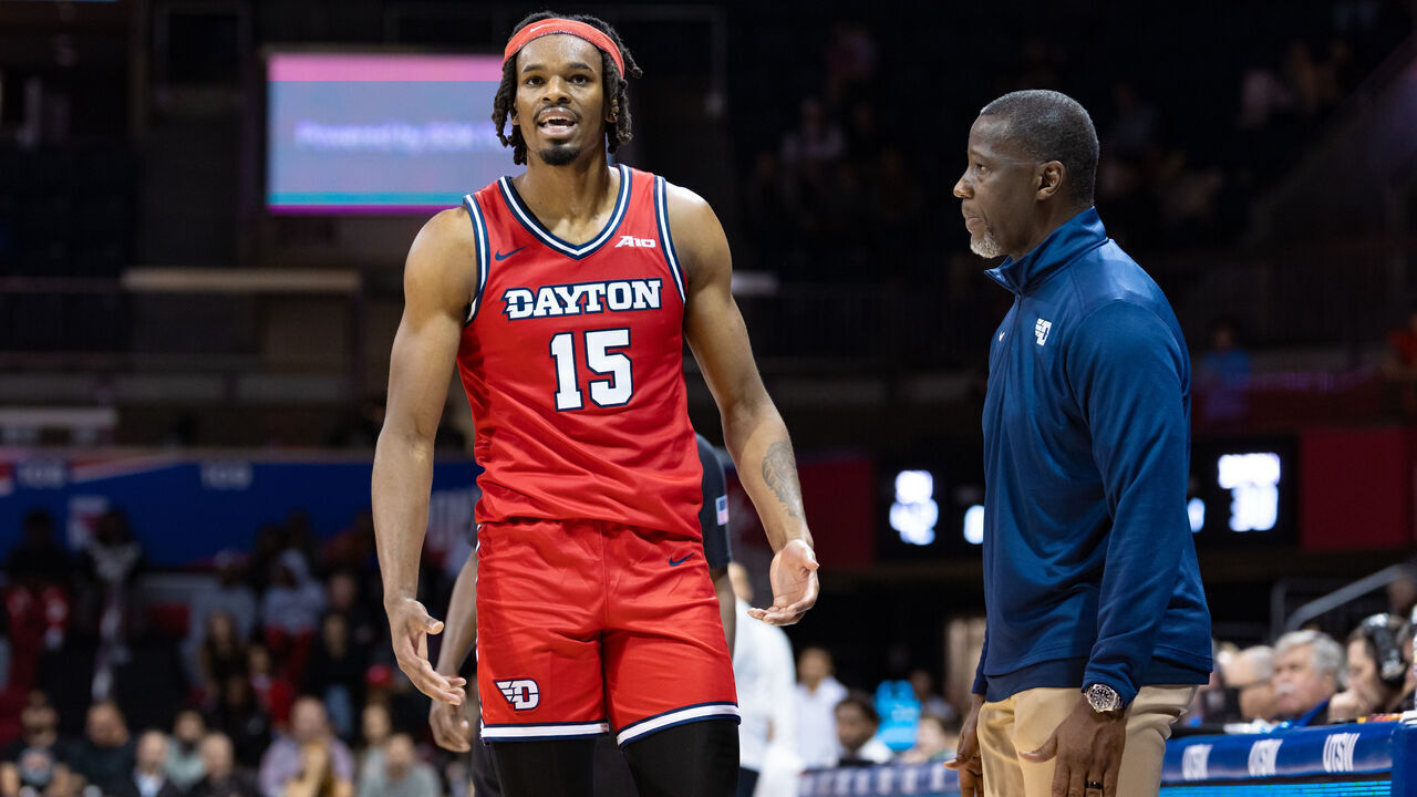 DALLAS, TX - NOVEMBER 29: Dayton Flyers forward DaRon Holmes II (#150 talks to head coach Anthony Grant during the college basketball game between the SMU Mustangs and the Dayton Flyers on November 29, 2023 at Moody Colseum in Dallas, Texas.
