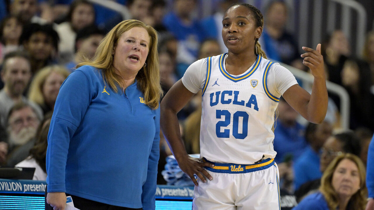 LOS ANGELES, CALIFORNIA - JANUARY 26: Head coach Cori Close talks with Charisma Osborne #20 of the UCLA Bruins in the game against the Washington Huskies at UCLA Pauley Pavilion on January 26, 2024 in Los Angeles, California.