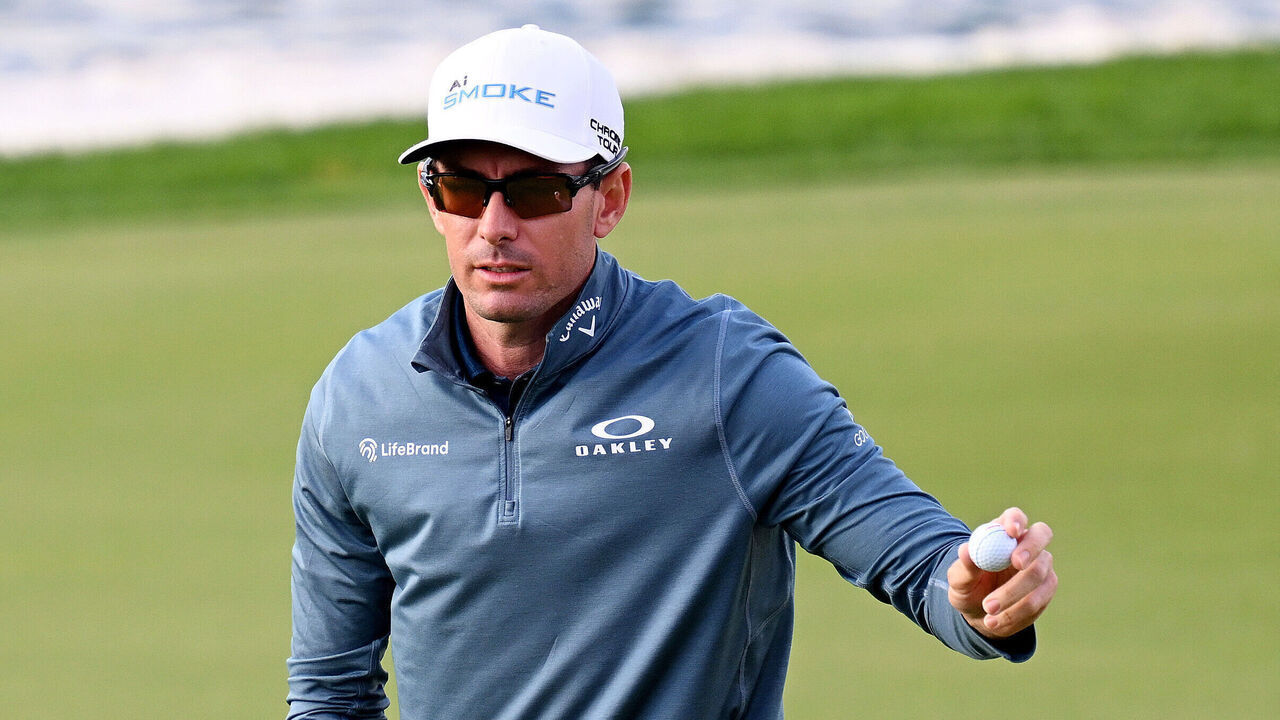 BAHRAIN, BAHRAIN - FEBRUARY 03: Dylan Frittelli of South Africa acknowledges the crowd on the 18th green during Day Three of the Ras Al Khaimah Championship at Royal Golf Club on February 03, 2024 in Bahrain, Bahrain.