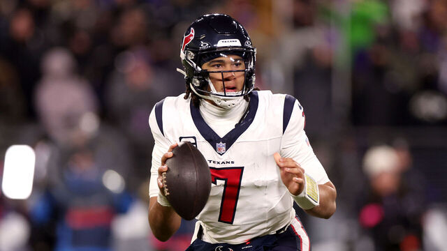 BALTIMORE, MARYLAND - JANUARY 20: Quarterback C.J. Stroud #7 of the Houston Texans rolls out to pass against the Baltimore Ravens in the second half at M&T Bank Stadium on January 20, 2024 in Baltimore, Maryland.