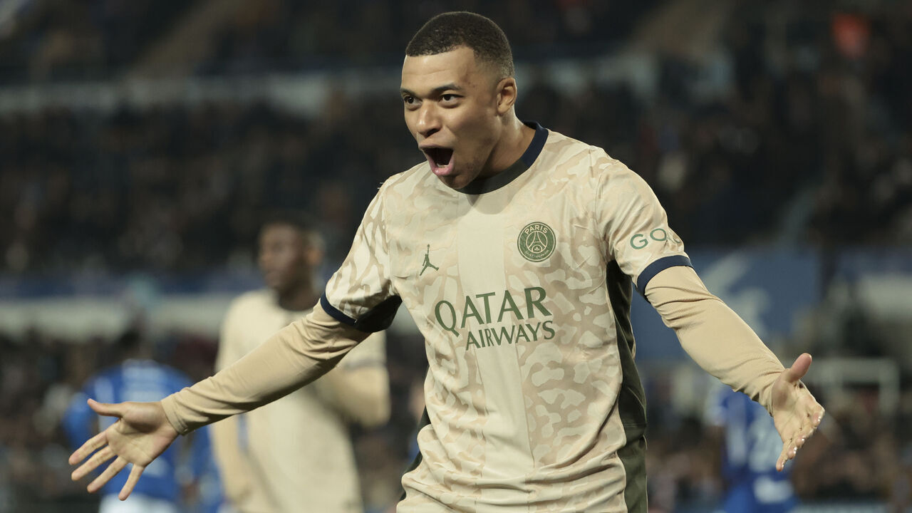 STRASBOURG, FRANCE - FEBRUARY 2: Kylian Mbappe of PSG celebrates the goal of Marco Asensio during the Ligue 1 Uber Eats match between RC Strasbourg Alsace (RCSA) and Paris Saint-Germain (PSG) at Stade de la Meinau on February 2, 2024 in Strasbourg, France.