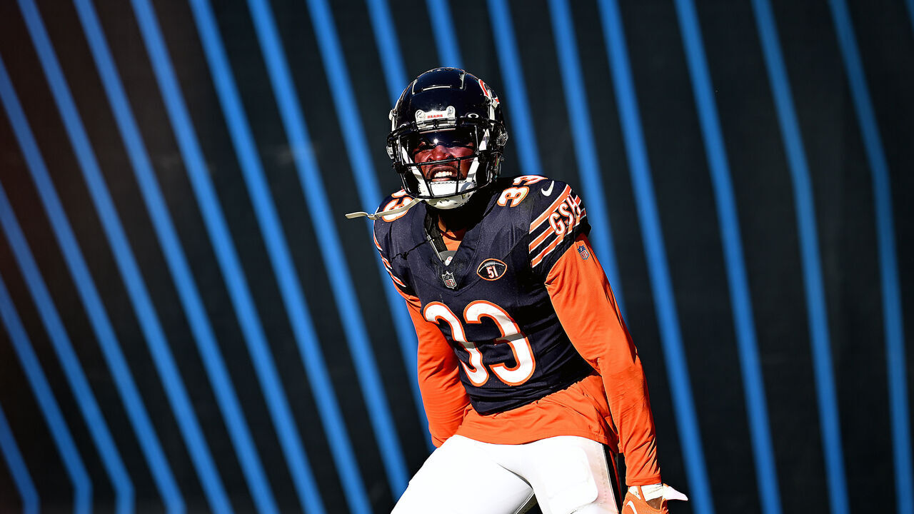 CHICAGO, ILLINOIS - OCTOBER 22: Jaylon Johnson #33 of the Chicago Bears reacts after an interception during the second half against the Las Vegas Raiders at Soldier Field on October 22, 2023 in Chicago, Illinois.