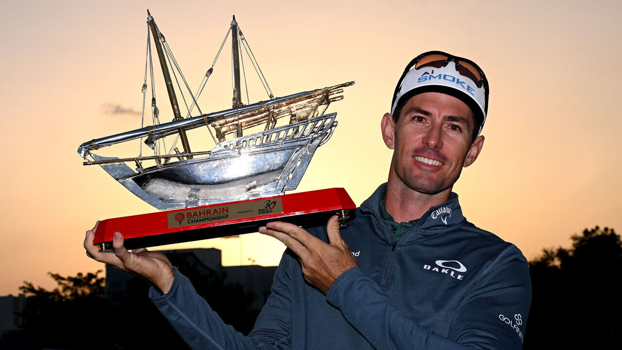 BAHRAIN, BAHRAIN - FEBRUARY 04: Dylan Frittelli of South Africa poses with the trophy as he celebrates victory following Day Four of the Ras Al Khaimah Championship at Royal Golf Club on February 04, 2024 in Bahrain, Bahrain.