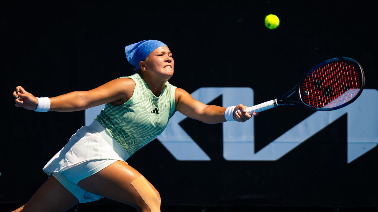 MELBOURNE, AUSTRALIA - JANUARY 15: Diana Shnaider in action against Jasmine Paolini of Italy in the women's singles first round match on Day 2 of the 2024 Australian Open at Melbourne Park on January 15, 2024 in Melbourne, Australia.