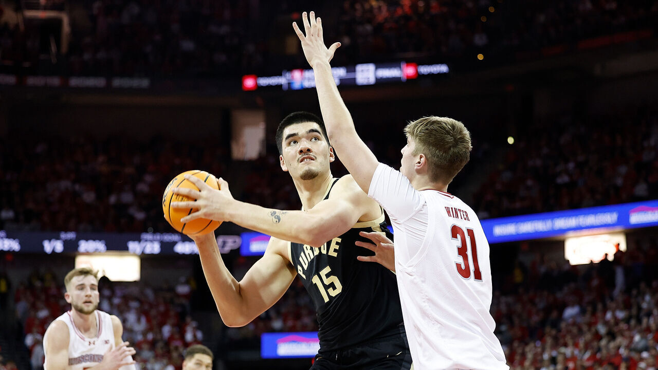 MADISON, WISCONSIN - FEBRUARY 04: Zach Edey #15 of the Purdue Boilermakers looks to shoot over Nolan Winter #31 of the Wisconsin Badgers in the first half of the game at Kohl Center on February 04, 2024 in Madison, Wisconsin.