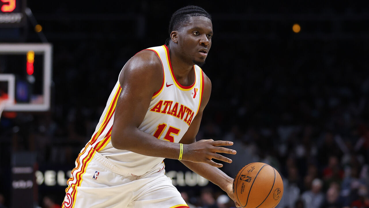 ATLANTA, GEORGIA - JANUARY 26: Clint Capela #15 of the Atlanta Hawks passes during the third quarter against the Dallas Mavericks at State Farm Arena on January 26, 2024 in Atlanta, Georgia.