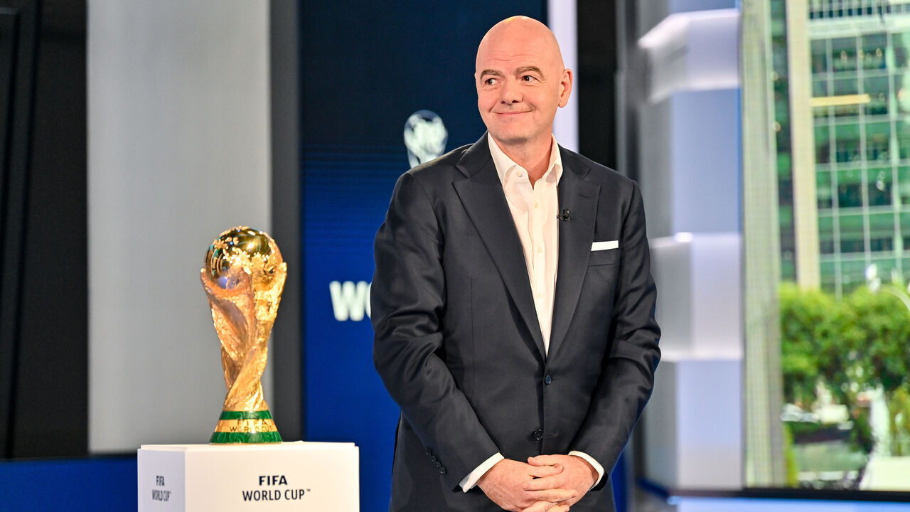 NEW YORK, NY - JUNE 16: FIFA President Gianni Infantino with the FIFA World Cup Winner's Trophy during the FIFA World Cup 2026 Host City Announcement on June 16, 2022 in New York City.