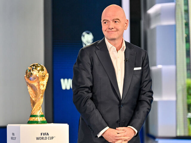 NEW YORK, NY - JUNE 16: FIFA President Gianni Infantino with the FIFA World Cup Winner's Trophy during the FIFA World Cup 2026 Host City Announcement on June 16, 2022 in New York City.