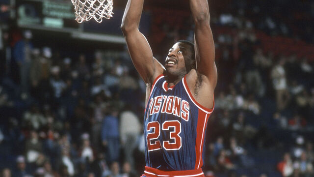 LANDOVER, MD - CIRCA 1985: Earl Cureton #23 of the Detroit Piston goes in for a slam dunk against the Washington Bullets during an NBA basketball game circa 1985 at the Capital Centre in Landover, Maryland. Cureton played for the Pistons from 1983-86. *** Local Caption *** Earl Cureton