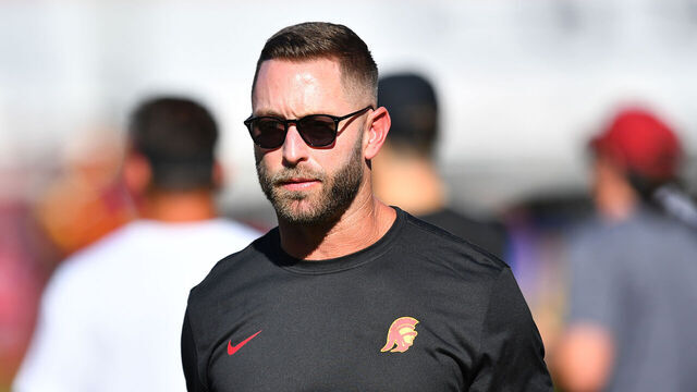 LOS ANGELES, CA - AUGUST 26: USC Trojans senior offensive analyst Kliff Kingsbury looks on before a game between the San Jose State Spartans and the USC Trojans on August 26, 2023, at Los Angeles Memorial Coliseum in Los Angeles, CA.