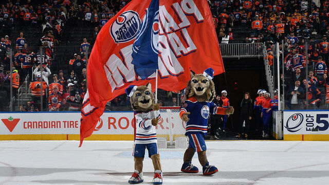 EDMONTON, CANADA - DECEMBER 10: Edmonton Oilers mascots Hunter and Kit salute fans after their team's win over the New Jersey Devils at Rogers Place on December 10, 2023, in Edmonton, Alberta, Canada.