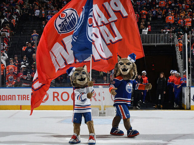 EDMONTON, CANADA - DECEMBER 10: Edmonton Oilers mascots Hunter and Kit salute fans after their team's win over the New Jersey Devils at Rogers Place on December 10, 2023, in Edmonton, Alberta, Canada.