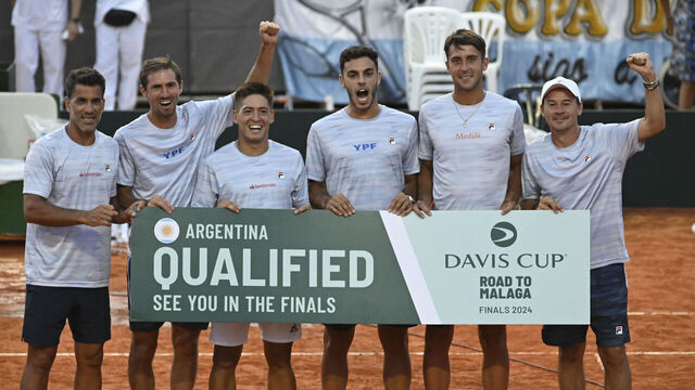 Argentina's Sebastian Baez (3-L) celebrates with teammates after defeating Kazakhstan's Dmitry Popko during the Davis Cup qualifying round between Argentina and Kazakhstan in Rosario, Argentina, on February 4, 2024.