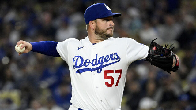 Los Angeles, CA - September 20: Relief pitcher Ryan Brasier #57 of the Los Angeles Dodgers throws to the plate against the Detroit Tigers in the seventh inning of a baseball game at Dodger Stadium in Los Angeles on Wednesday, September 20, 2023.