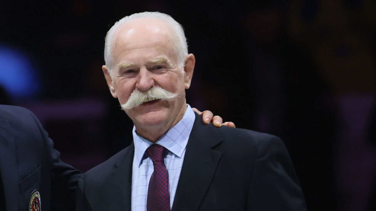 TORONTO, CANADA - NOVEMBER 12: Henrik Lundqvist is given his Hockey Hall of Fame blazer from Lanny McDonald at Air Canada Centre on November 12, 2023 in Toronto, Ontario, Canada.