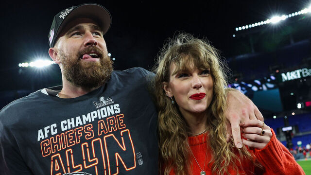 BALTIMORE, MARYLAND - JANUARY 28: Travis Kelce #87 of the Kansas City Chiefs (L) celebrates with Taylor Swift after defeating the Baltimore Ravens in the AFC Championship Game at M&T Bank Stadium on January 28, 2024 in Baltimore, Maryland.