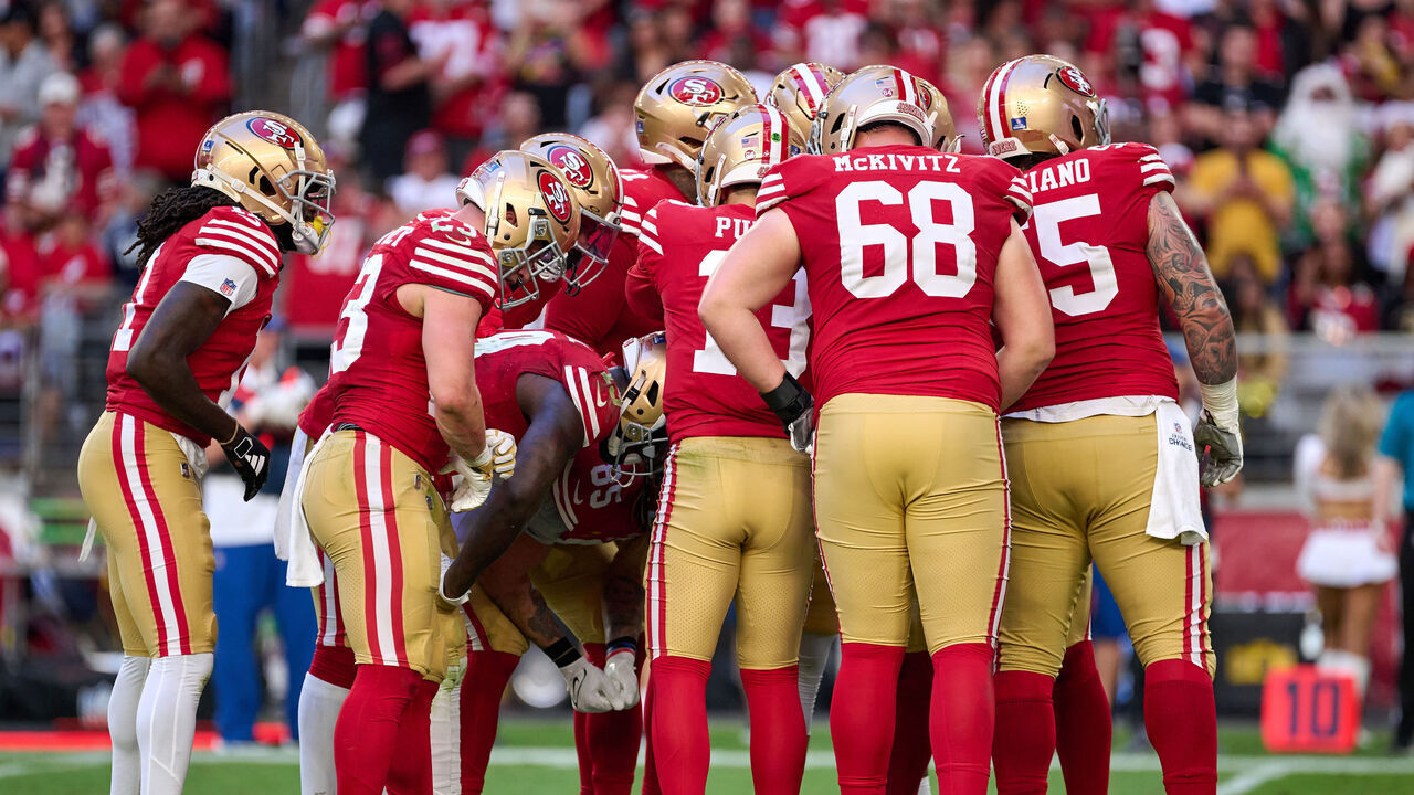 GLENDALE, ARIZONA - DECEMBER 17: Quarterback Brock Purdy #13 of the San Francisco 49ers leads a team huddle in action during a game between the San Francisco 49ers and the Arizona Cardinals at State Farm Stadium on December 17, 2023 in Glendale, Arizona.