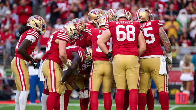 GLENDALE, ARIZONA - DECEMBER 17: Quarterback Brock Purdy #13 of the San Francisco 49ers leads a team huddle in action during a game between the San Francisco 49ers and the Arizona Cardinals at State Farm Stadium on December 17, 2023 in Glendale, Arizona.