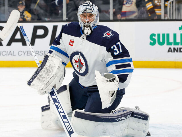 BOSTON, MASSACHUSETTS - JANUARY 22: Connor Hellebuyck #37 of the Winnipeg Jets warms up prior to a game against the Boston Bruins at the TD Garden on January 22, 2024 in Boston, Massachusetts. The Bruins won 4-1.