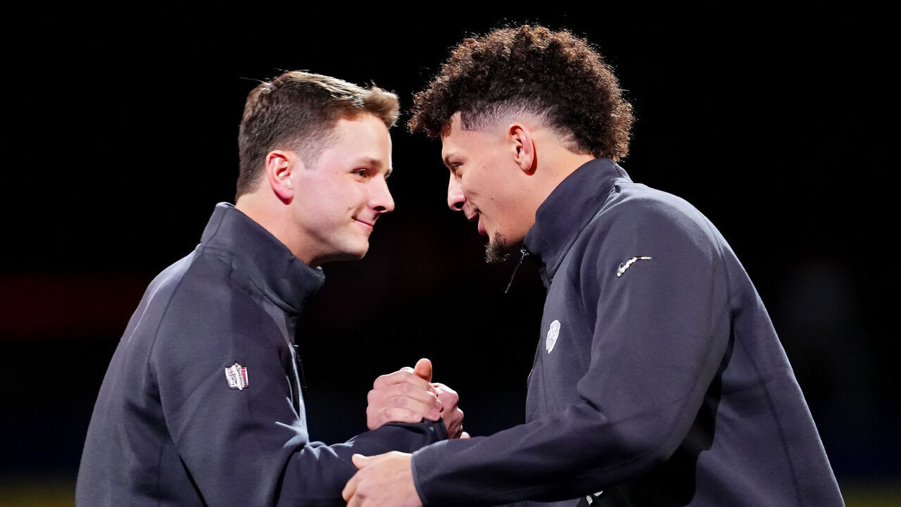 LAS VEGAS, NEVADA - FEBRUARY 05: Brock Purdy of the San Francisco 49ers (L) and Patrick Mahomes of the Kansas City Chiefs meet on stage during Super Bowl LVIII Opening Night at Allegiant Stadium on February 05, 2024 in Las Vegas, Nevada.