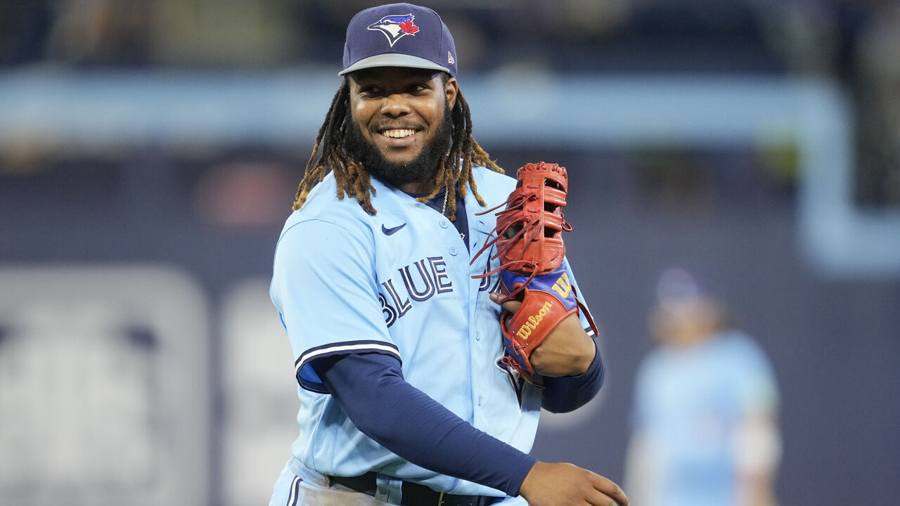 TORONTO, ON - SEPTEMBER 14: Vladimir Guerrero Jr. #27 of Toronto Blue Jays smiles in a break in play against the Texas Rangers in their MLB game at the Rogers Centre on September 14, 2023 in Toronto, Ontario, Canada.