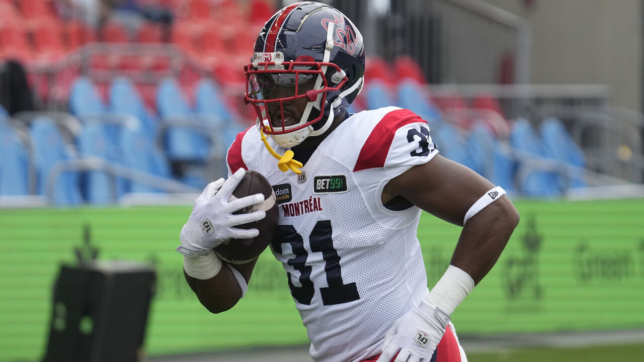 TORONTO, CANADA - SEPTEMBER 9: William Stanback #31 of the Montreal Alouettes runs with the football during warm up before a game against the Toronto Argonauts at BMO Field on September 9, 2023 in Toronto, Canada.