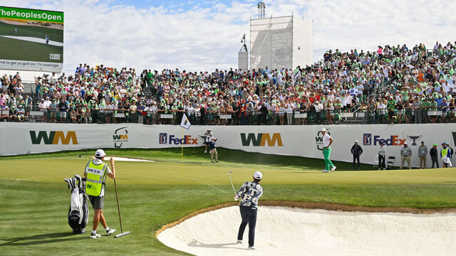 SCOTTSDALE, ARIZONA - FEBRUARY 11: Si Woo Kim of South Korea hits a shot from the bunker on the 16th hole during the third round of the WM Phoenix Open at TPC Scottsdale on February 11, 2023 in Scottsdale, Arizona.