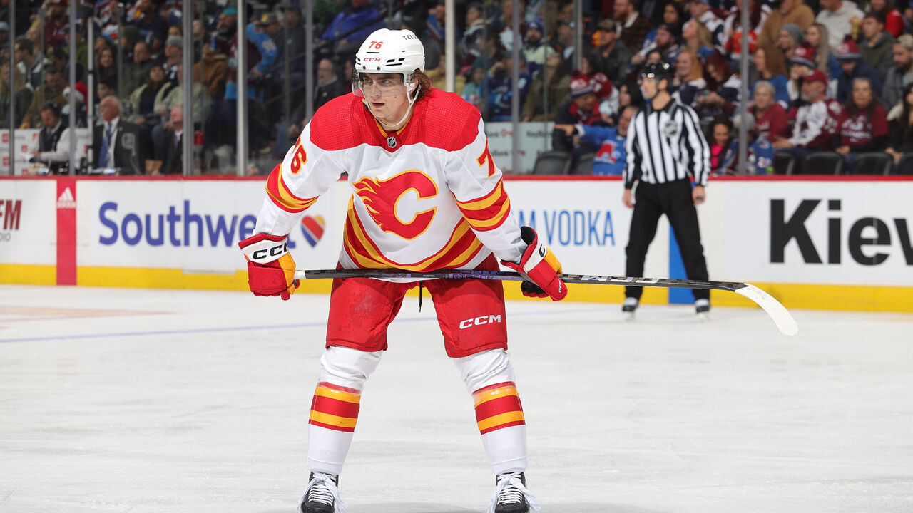 DENVER, COLORADO - NOVEMBER 25: Martin Pospisil #76 of the Calgary Flames awaits a face-off against the Colorado Avalanche at Ball Arena on November 25, 2023 in Denver, Colorado.