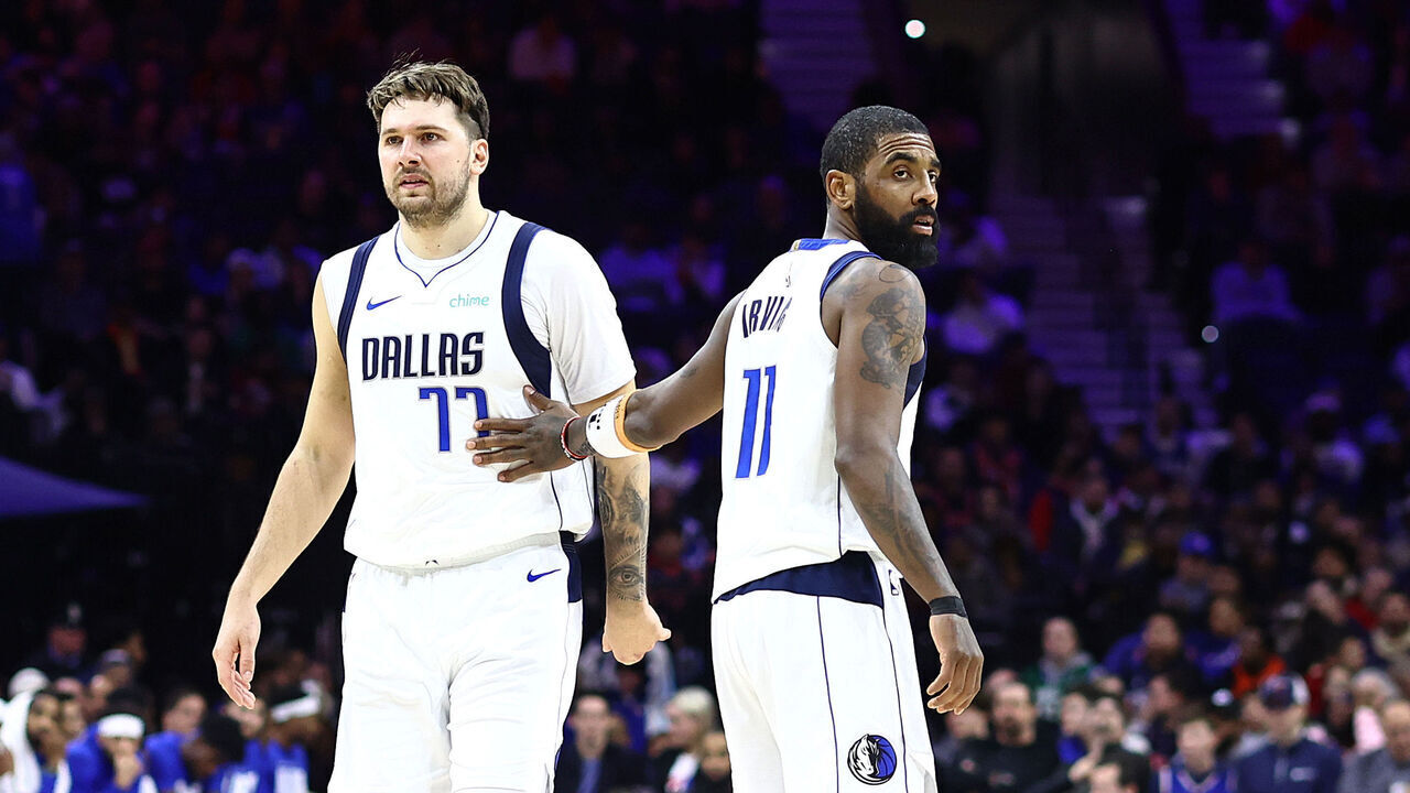 PHILADELPHIA, PENNSYLVANIA - FEBRUARY 05: Luka Doncic #77 of the Dallas Mavericks and Kyrie Irving #11 of the Dallas Mavericks look on during the fourth quarter against the Philadelphia 76ers at the Wells Fargo Center on February 05, 2024 in Philadelphia, Pennsylvania.