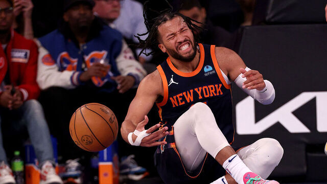 NEW YORK, NEW YORK - FEBRUARY 06: Jalen Brunson #11 of the New York Knicks reacts after he rolled his his ankle s in the fourth quarter against the Memphis Grizzlies at Madison Square Garden on February 06, 2024 in New York City. Brunson left the game and did not return.