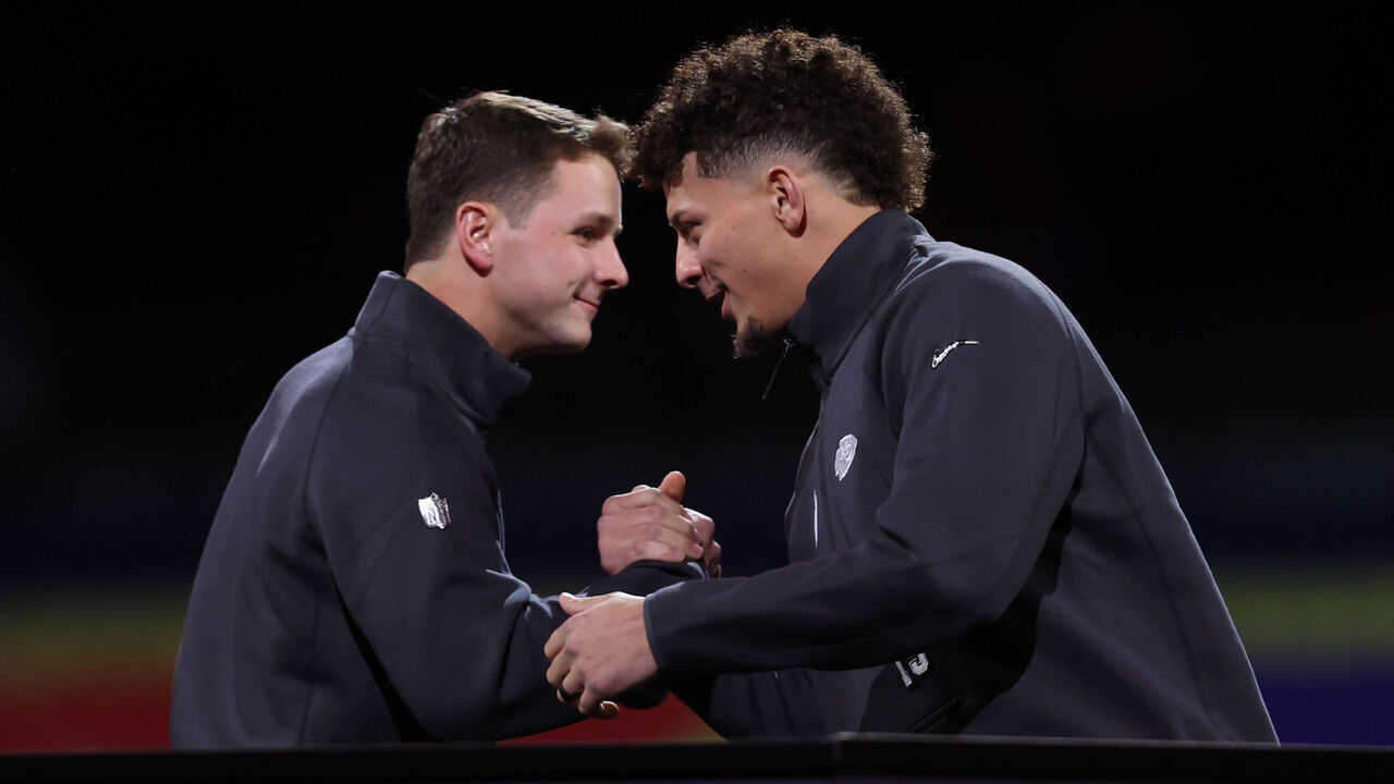 LAS VEGAS, NV - FEBRUARY 5: Brock Purdy #13 of the San Francisco 49ers and Patrick Mahomes #15 of the Kansas City Chiefs shake hands during Super Bowl LVIII Opening Night at Allegiant Stadium on February 5, 2024 in Las Vegas, NV.