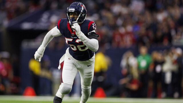 HOUSTON, TEXAS - JANUARY 13: Jonathan Greenard #52 of the Houston Texans runs around the edge during an AFC wild-card playoff football game against the Cleveland Browns at NRG Stadium on January 13, 2024 in Houston, Texas.